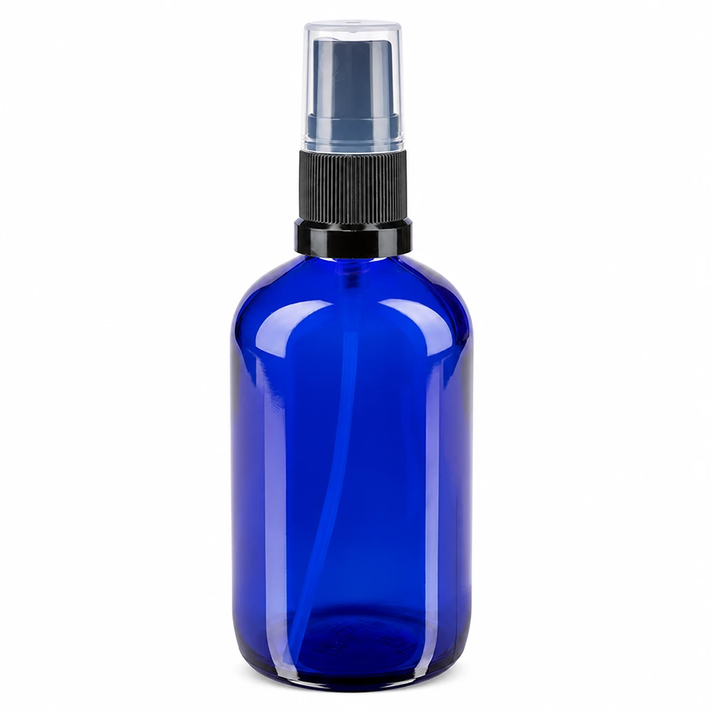 Flacone spray blu da 100 ml. STD nero/trasp. ApoGlas Flacone spray in vetro blu da 100 ml con erogatore nero e tappo protettivo trasparente, in vetro da farmacia