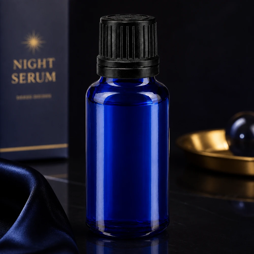 Flacone contagocce da 20 ml blu cobalto con tappo OV nero per sieri e oli essenziali