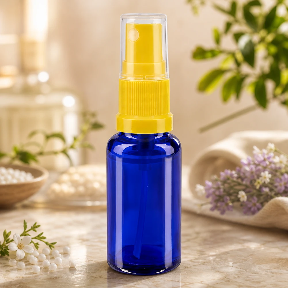 Flacone spray blu da 20ml STD giallo/trasparente in vetro da farmacia Flacone spray compatto da 20 ml in vetro blu con protezione UV e pompa gialla per farmacie