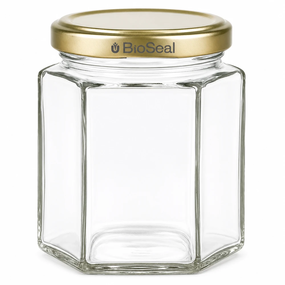 Vasetto per miele da 250 g con capsula dorata BioSeal UNiTWIST vasetto di miele da 250 g esagonale con tappo a vite BioSeal dorato vasetto di vetro trasparente vuoto per miele