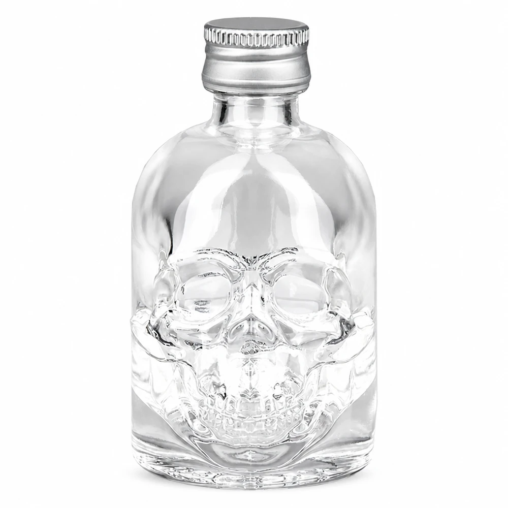 Bottiglia in vetro Hector da 50 ml con teschio in rilievo e tappo a vite UNiTWIS argentato su sfondo bianco