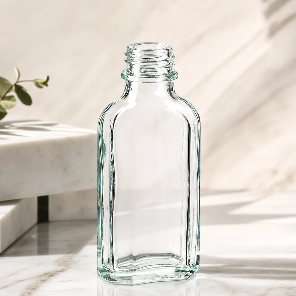 Flacone trasparente a fondo piatto da 50 ml con filettatura DIN22 per oli essenziali e cosmetici