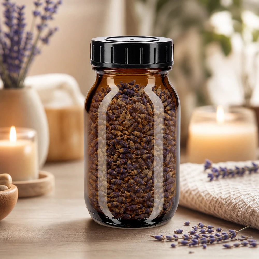 Bottiglia a collo largo da 100 ml in vetro ambrato con tappo a vite Bottiglia a collo largo da 100 ml in vetro ambrato con tappo nero per una conservazione a prova di aromi