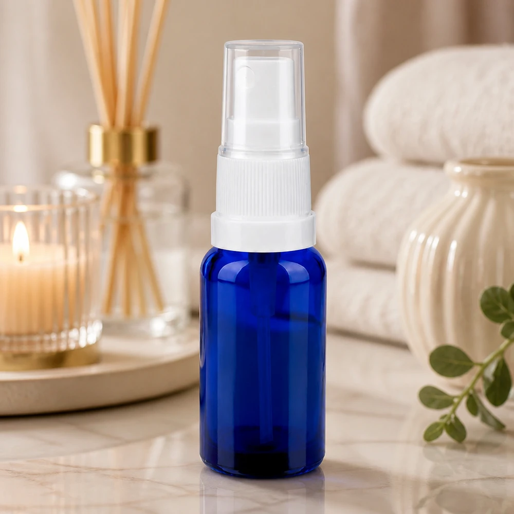 Flacone spray da 20 ml bianco/trasparente STD BlueLine UT18/20 Flacone in vetro blu da 20 ml con pompa spray e tappo protettivo trasparente filettatura STD