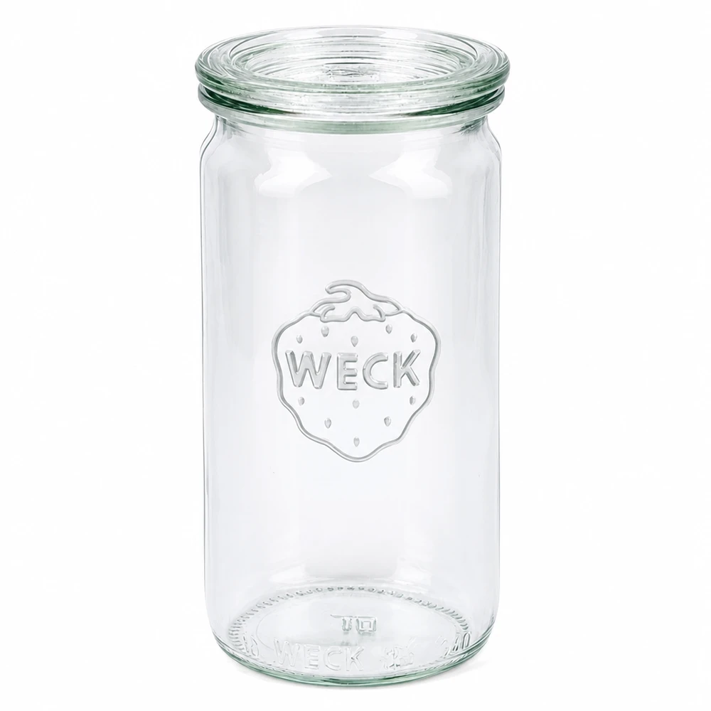 Vaso cilindrico da 340 ml con coperchio in vetro WECK RR60 Vaso cilindrico WECK 340ml con coperchio in vetro RR60 vaso per conserve trasparente vuoto su sfondo bianco
