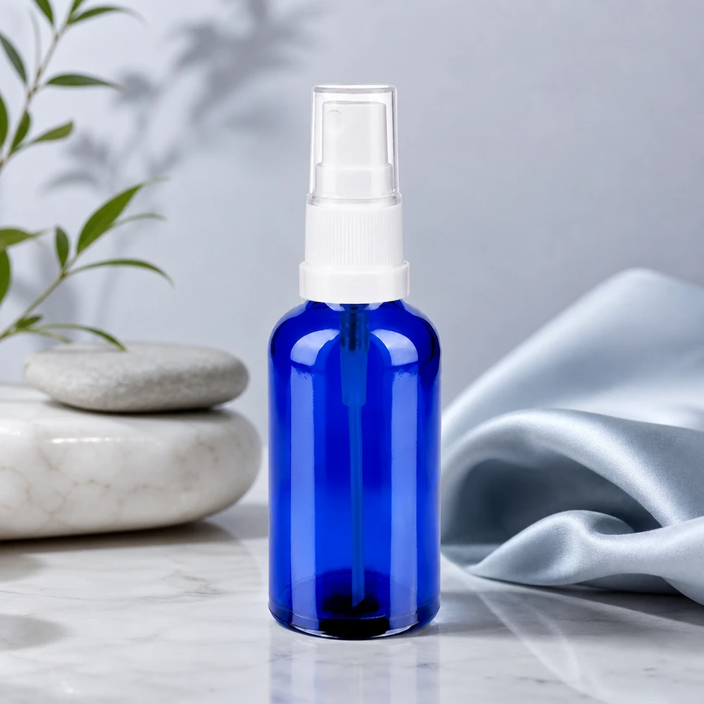 Flacone spray da 50 ml bianco/tr. STD BlueLine UT18/50 Flacone spray in vetro ecologico da 50 ml come alternativa sostenibile ai flaconi in plastica
