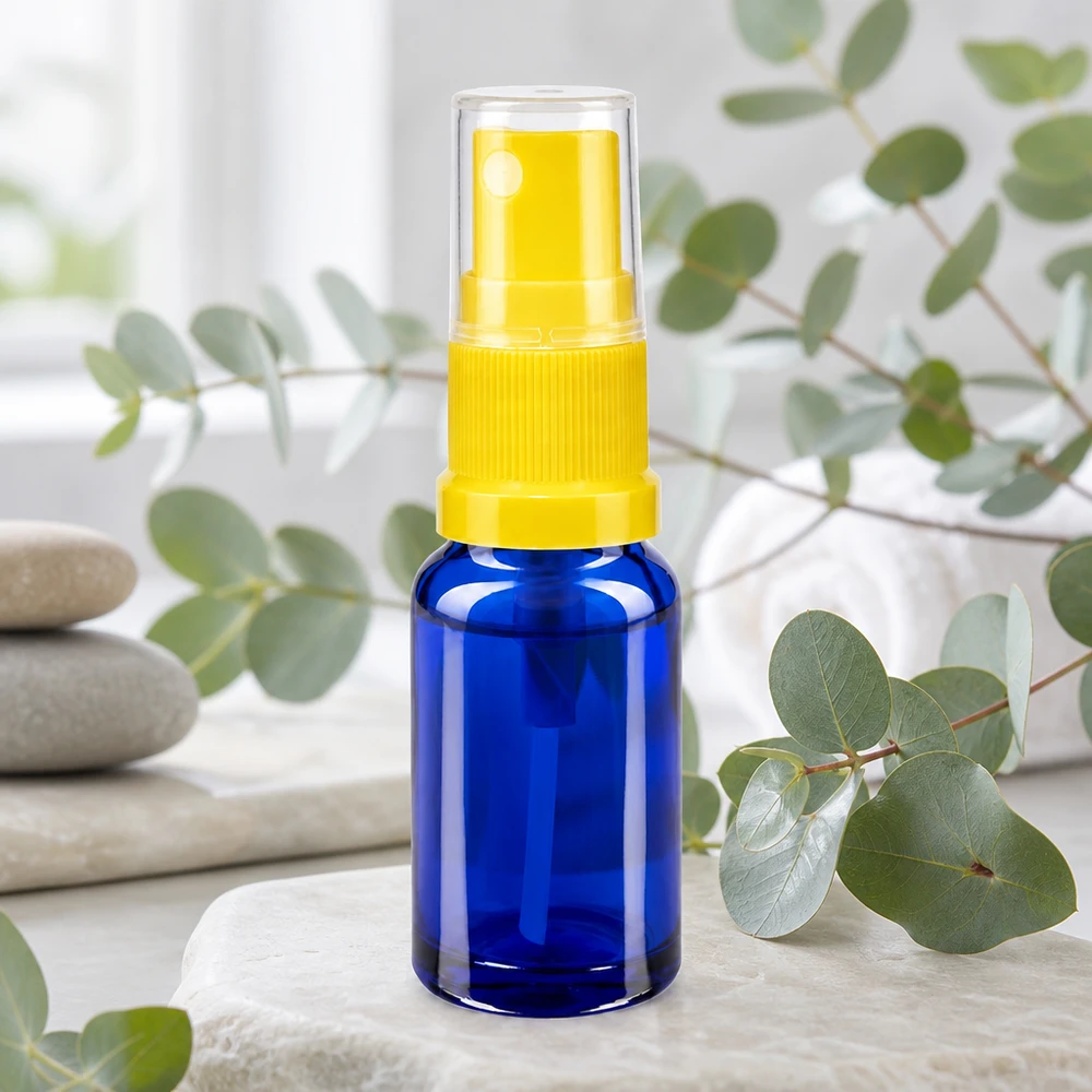 Flacone spray blu da 10ml STD giallo/trasparente apoGlas Flacone atomizzatore compatto da 10 ml in vetro protettivo blu con erogatore giallo per oli essenziali