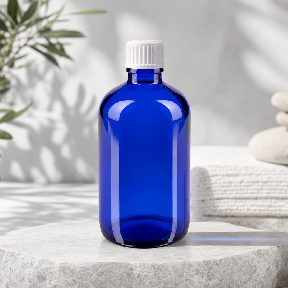 Flacone da farmacia blu da 100 ml con protezione UV e tappo standard bianco per oli essenziali