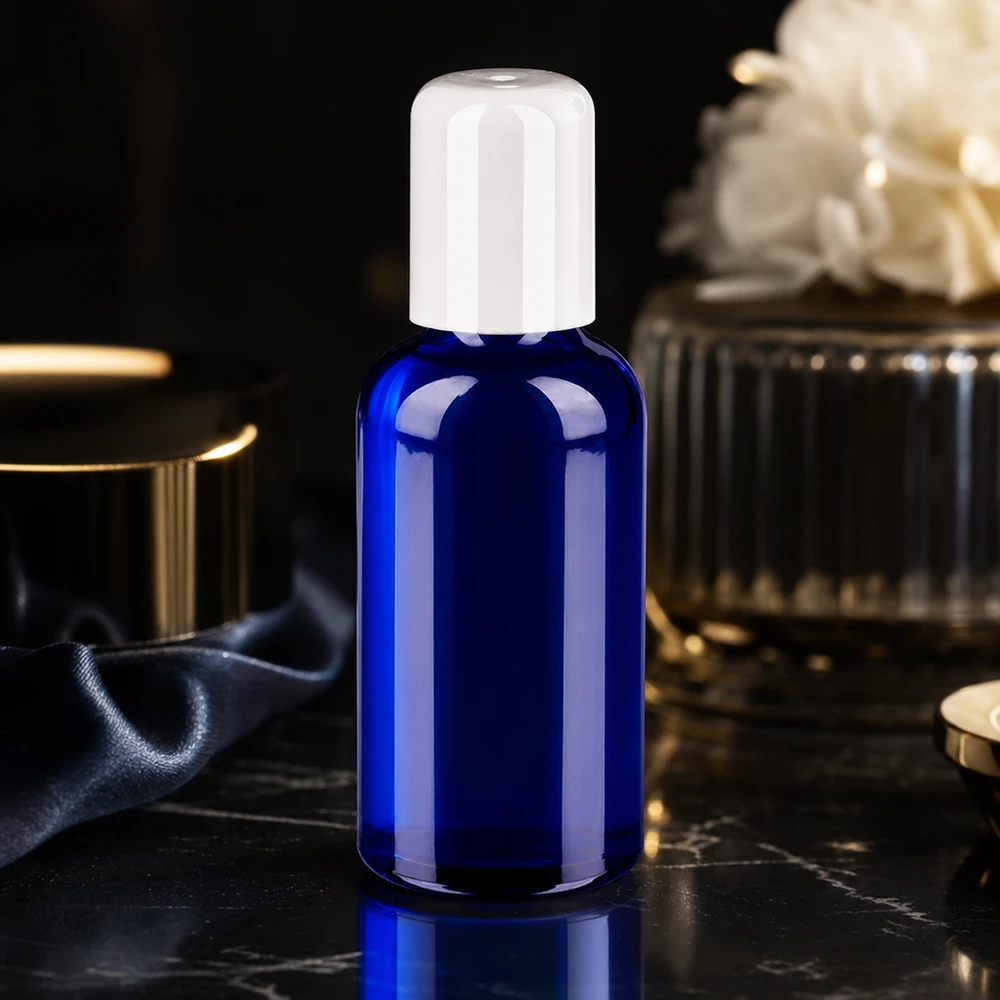 Flacone roll-on da 50 ml bianco STD BlueLine UT18/50 Contenitore roll-on da 50 ml in vetro robusto di colore blu intenso con tappo igienico bianco