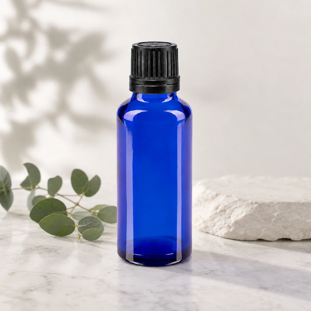 Flacone farmaceutico in vetro blu da 30 ml con tappo a vite nero e contagocce