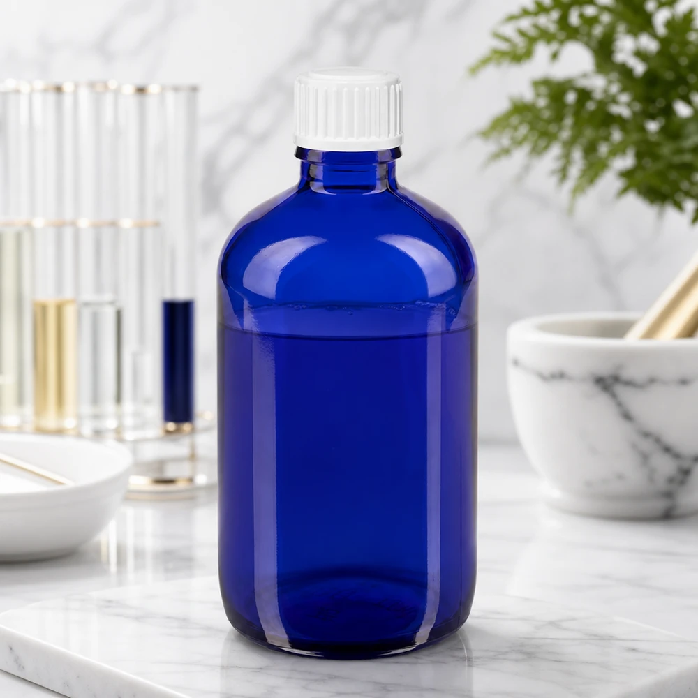 Flacone contagocce resistente alla luce da 100 ml, colore blu cobalto, con inserto dosatore di precisione da 0,9 mm per applicazioni di laboratorio