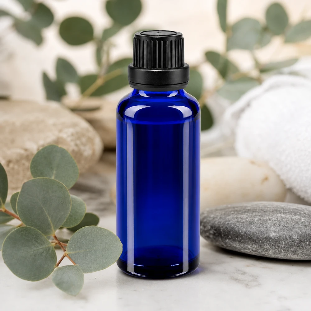 Flacone contagocce blu da 30ml OV nero/2mm ApoGlas Flacone contagocce da 30 ml in vetro da farmacia di colore blu cobalto, con tappo di sicurezza a prova di bambino e sigillo di integrità originale di colore nero