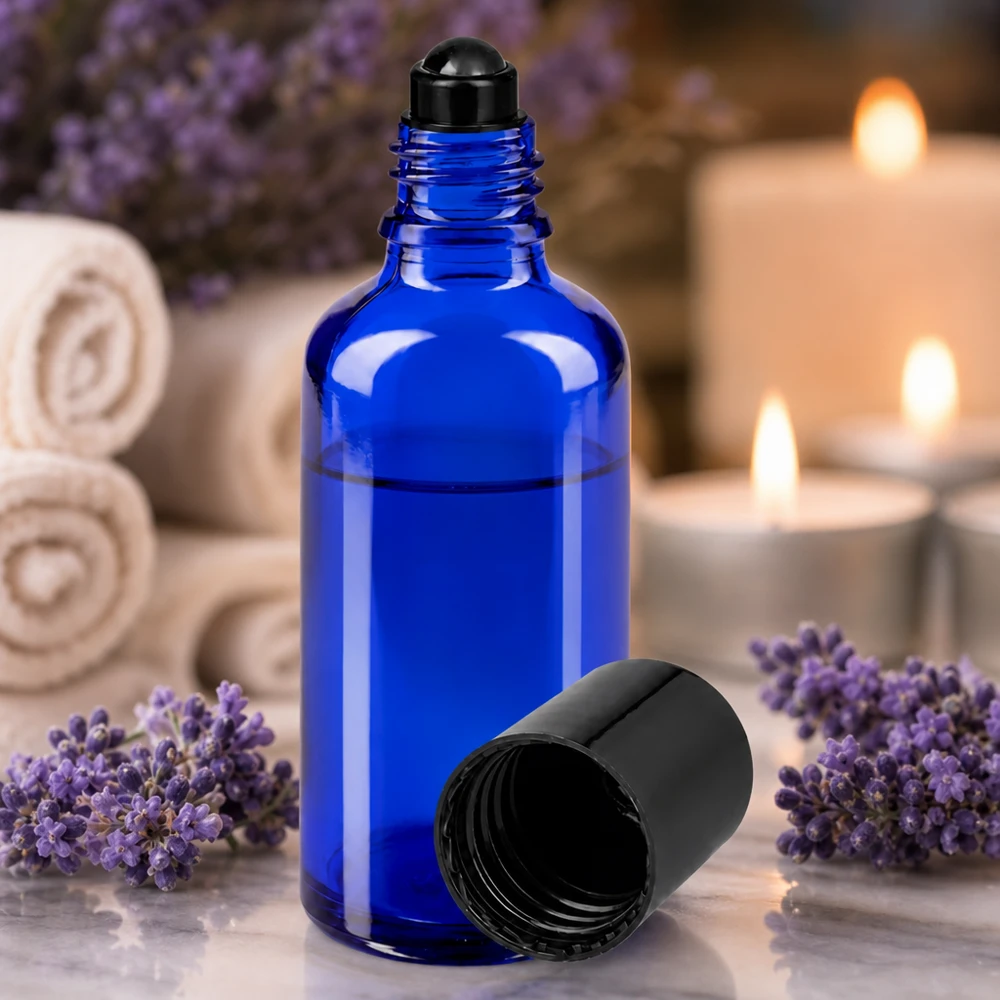 Flacone roll-on 50ml blu STD nero ApoGlas Flacone roll-on da 50 ml in vetro protettivo blu cobalto con applicatore a sfera nero per aromaterapia