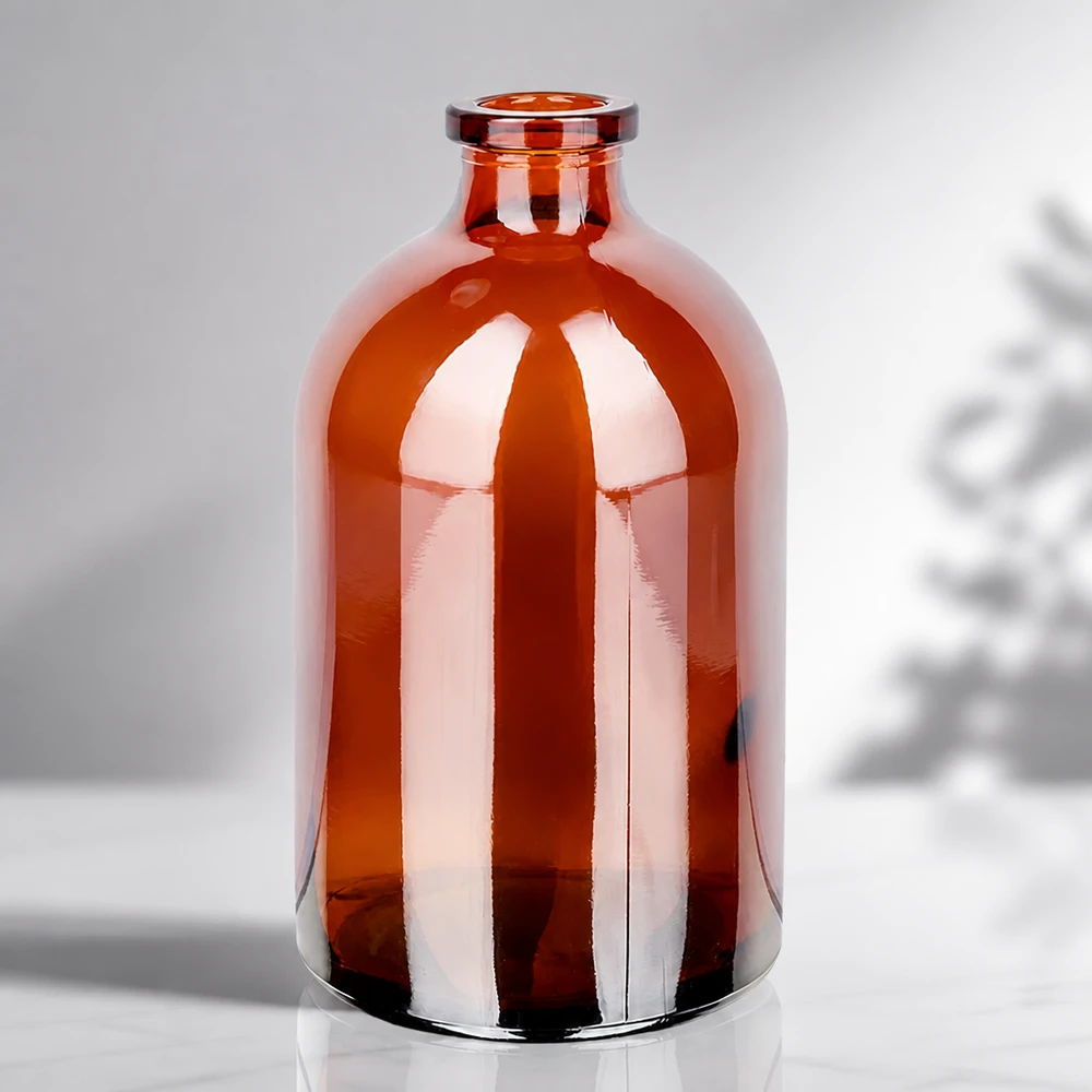 Flacone per iniezione in vetro ambrato 100ml Sterile Glasflasche 100ml in Bernsteinfarbe mit charakteristischer Apothekerflasche-Silhouette