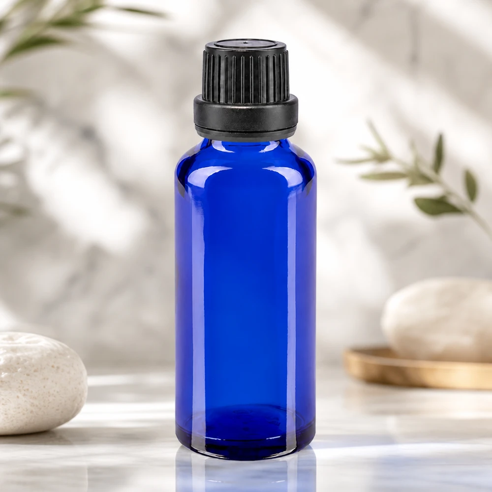 Piccolo flacone da farmacia da 30 ml in vetro blu cobalto con tappo a vite nero a prova di bambino